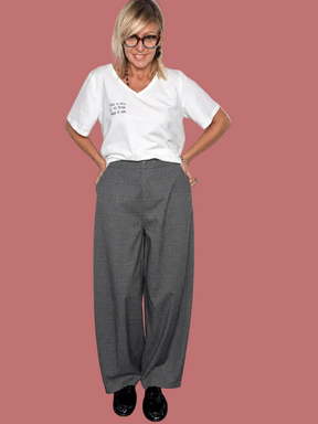 Pantalone grigio a quadri con linea ampia a ovetto