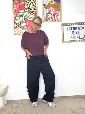 DEJA VU - Jeans donna banana neri con inserti in pizzo e fondo sfrangiato  stile casual chic A25RH206/ NERO DEJA VU 