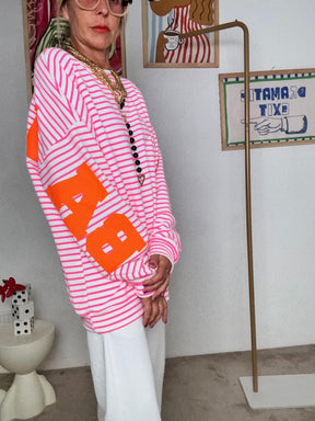 FEMALE - Felpa oversize donna a righe fuxia R7612-BALANCE/ RIGA FUXIA FEMALE 