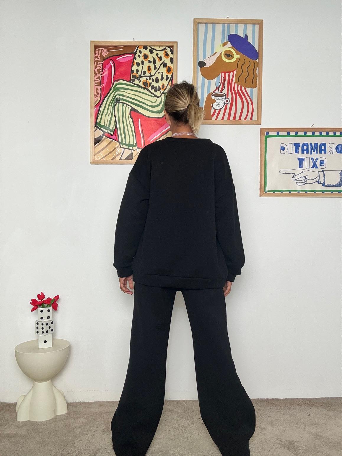 FEMALE - Pantalone ampio e comodo: stile minimal e contemporaneo  NERO R50075/ NERO FEMALE 