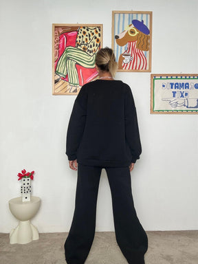 FEMALE - Pantalone ampio e comodo: stile minimal e contemporaneo  NERO R50075/ NERO FEMALE 