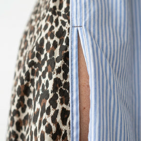 Long patchwork shirt — Fabric Patchwork Detail | Generated by Modelize