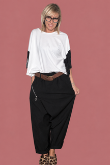 Pantalone over con drappeggio e zip diagonale